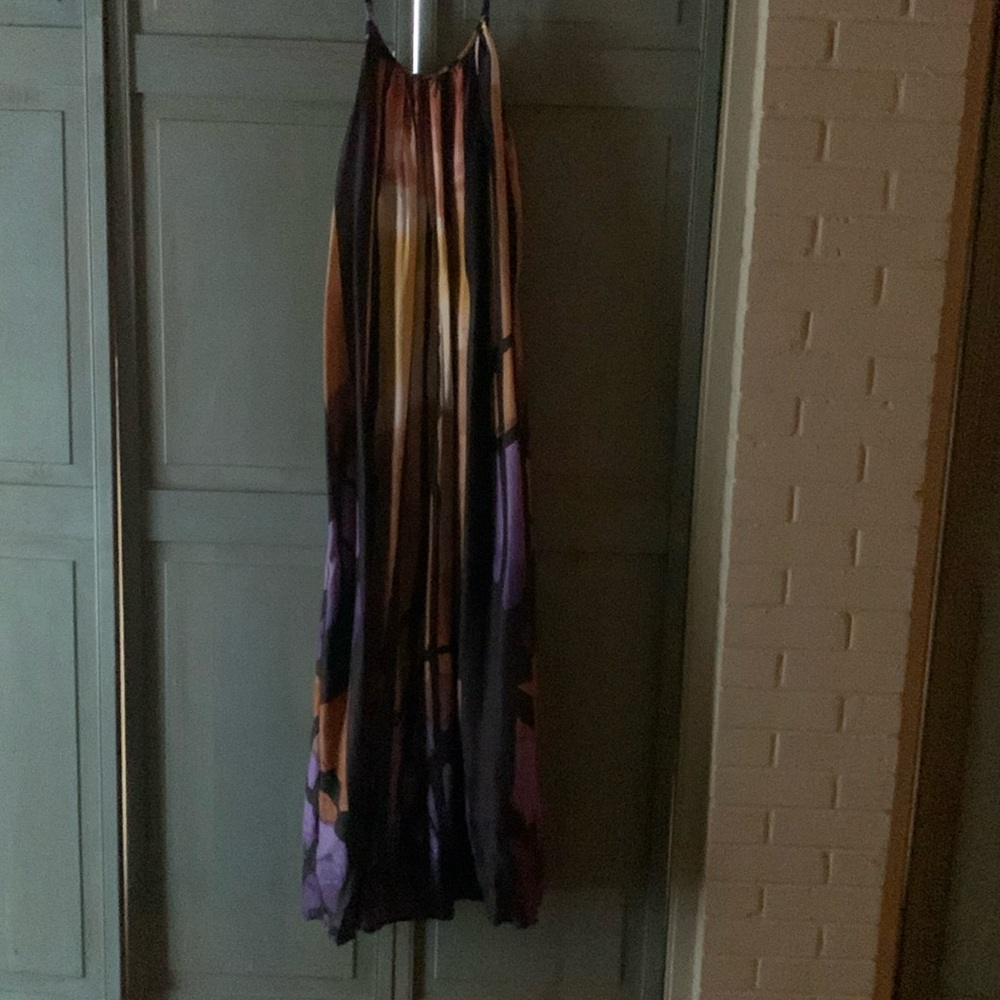 Patterned maxi dress with adjustable straps.
